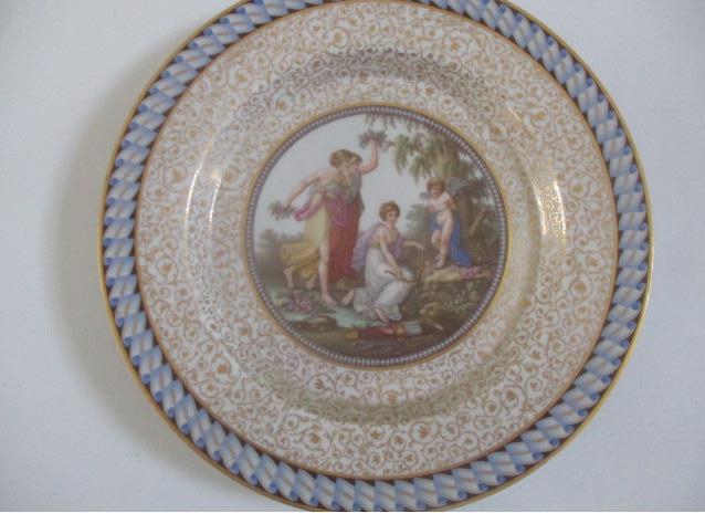 Porcelain Plate with Nymphs and Angel: Label on back says "Berlin Plate from Collection of William 2nd of Holland - Purchased after his death in 1850 by Chancellor Roby of Albany - Label Copied onto newer paper - 9 1/2" - See photos for co