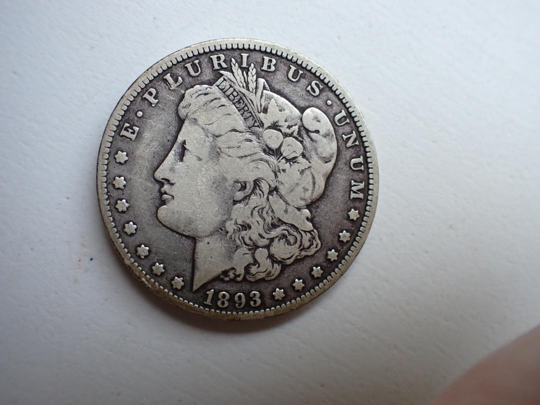 1893-O Morgan Silver Dollar: Please see photos for details and condition.