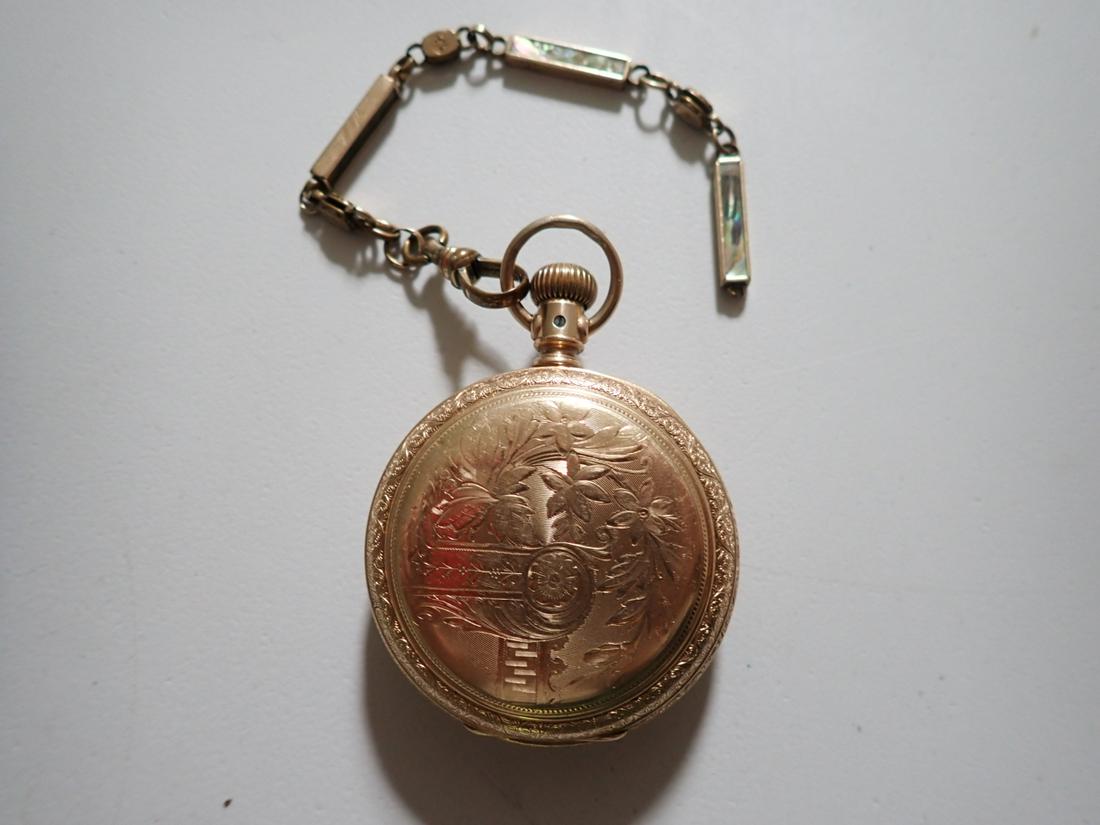 Ornate American Waltham Gold Filled Pocket Watch: Hunters Case. S/N 4071311. Partial Fob with Mother of Pearl - Runs for just a few seconds when wound. Please see photos for details and condition.