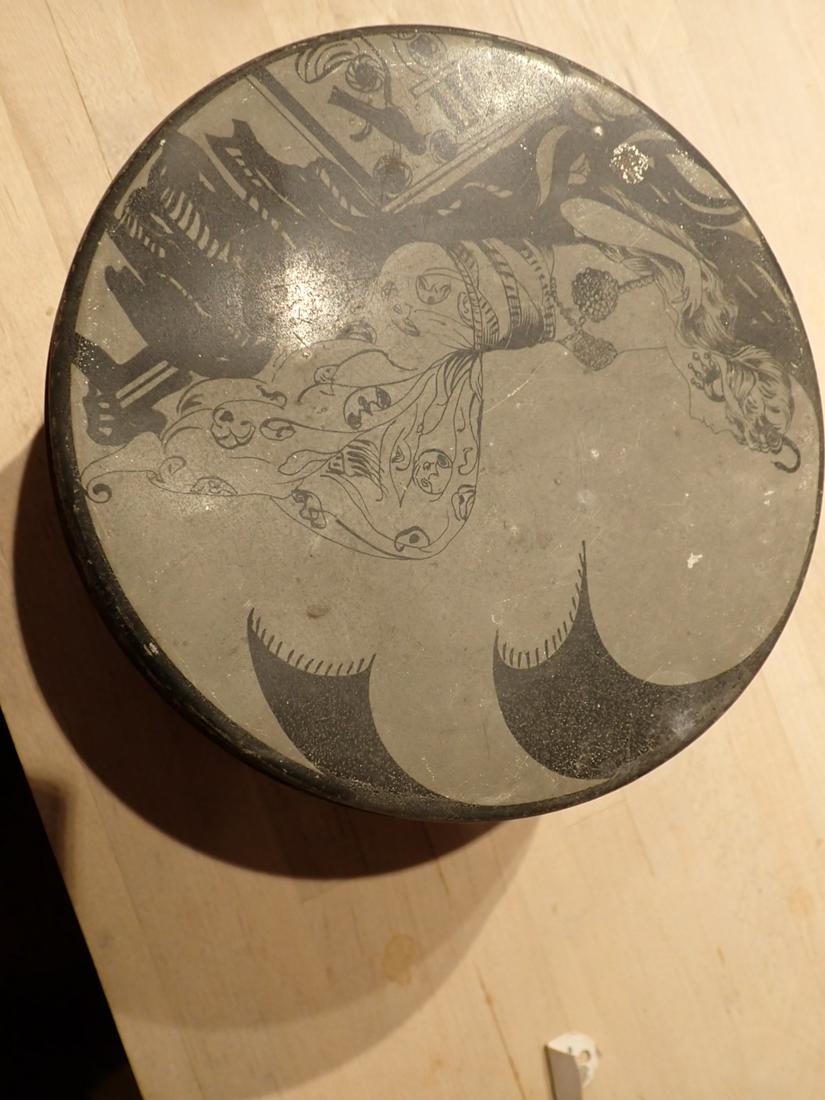 Art Deco Tin of Reclining Woman Circa 1920 - 1930's by: Cummings Corp. 6" Diameter. Please see photos and come to the 2 day preview for condition.