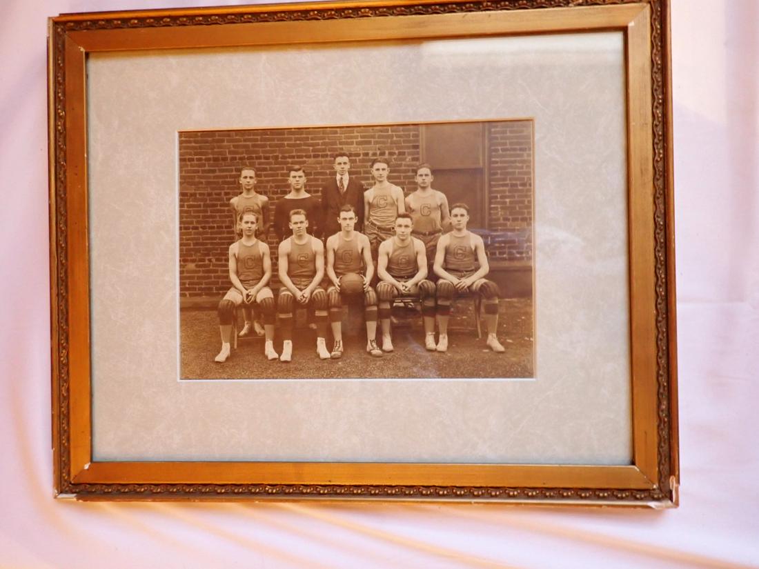 Early 1900's Basketball Team Photo: Consigner Believes it to be of Clark University . Frame: 12 1/2" x 15 1/2". Photo: 6 1/2" x 9" Please see photos and come to the 2 day preview for condition.