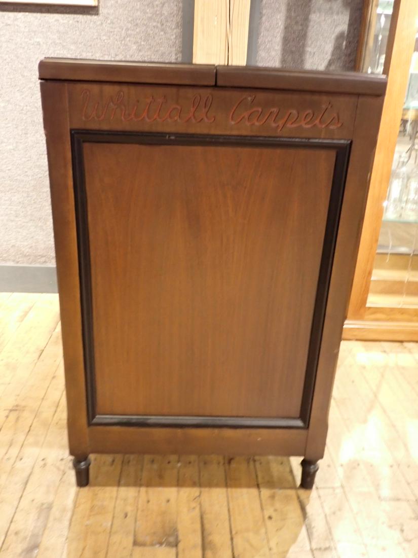 Whittall Carpets Sample Display Cabinet Marked Whittall: Carpets on each end 40" x 22' x 32" Please see photos and come to the 2 day preview for condition.