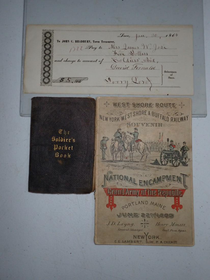 1861 Soldiers Pocket Book and Ephemera: 1861 The Soldier's Pocket Book, 1885 Grand Army of the Republic Portland, ME Encampment and 1864 $5 Soldier's Aid Check from Saco, Maine - Soldier's Pocket Book has loose binding and some staining. Ph