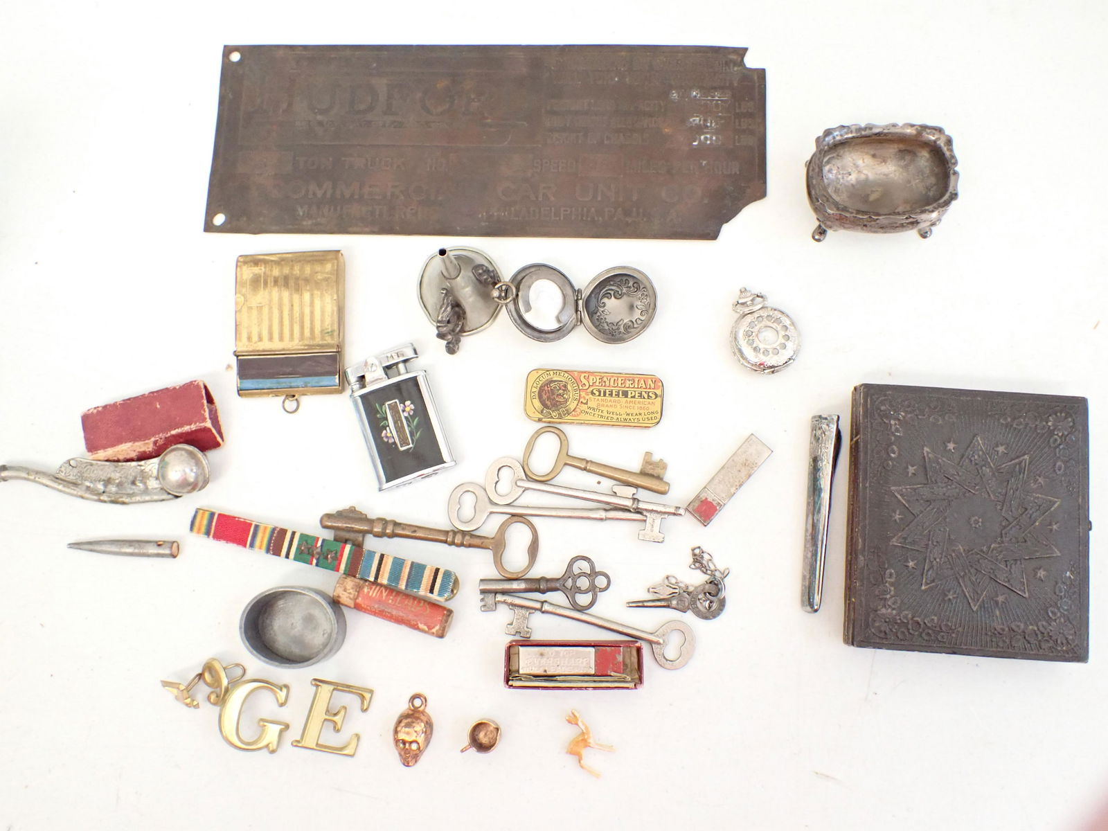 1916 Hudford Brass Plate, Lighter, Skull Charm, etc. (1 of 16)