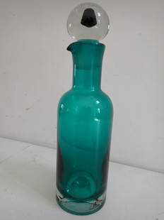 Riihimaki Finland Glass Bottle - Style of Nanny Still Bottle: Made in same city as Nanny Still Bottles - Aqua Blue 12 1/2" with Stopper - 10 1/2" without stopper. See photos for condition and details. Local pick-up available on February 4th or 3rd party