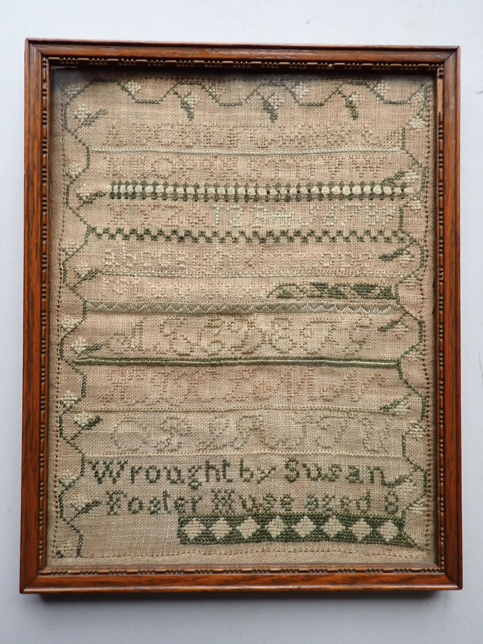 Sampler "Wrought by Susan Foster House" Early 19th Century: Sampler: 10" x 8". Frame: 11" x 8 1/2". Piece of tacking on frame is missing. See photos for condition and details.
