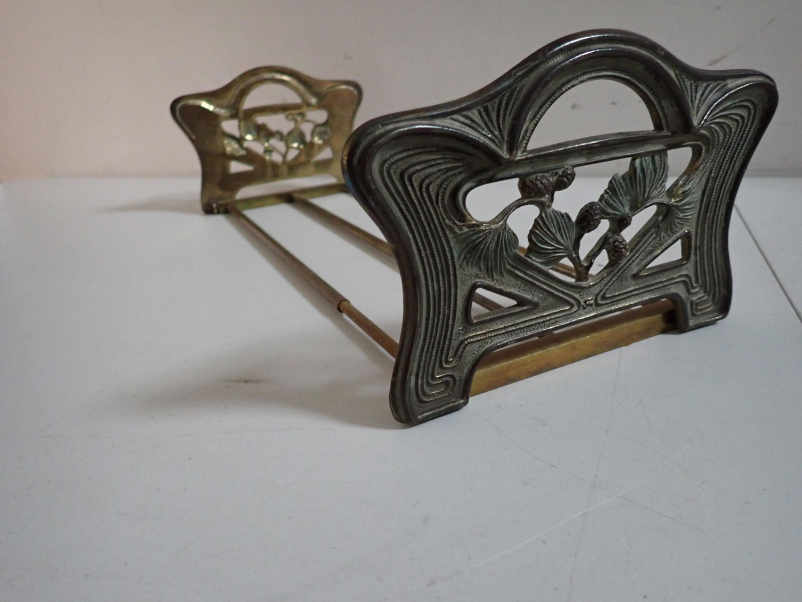 Antique Brass Sliding Book Rack with Pine Cone Design (1 of 5)