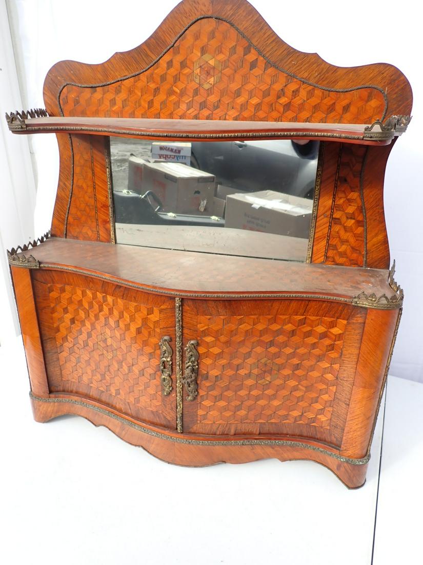 Antique MiniatureMarquetry Sideboard with Mirror: Has Brass Railings and Trim, Serpentine Design with Inwardly Curved Sides. Slight Trim damage and slight wear on surfaces but overall very good condition. 28" high x 24" wide x 7" deep. See photos for