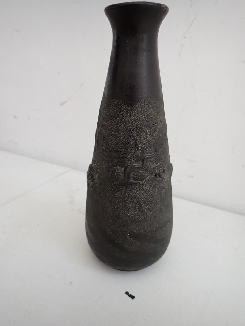 Chinese Antique Dragon Vase - Brown Color over Terra Cotta or: Red Clay with Embossed Dragon Design 7 1/2". See photos for condition and details Local pick-up available on February 4th or 3rd party shipping available. Please see terms.