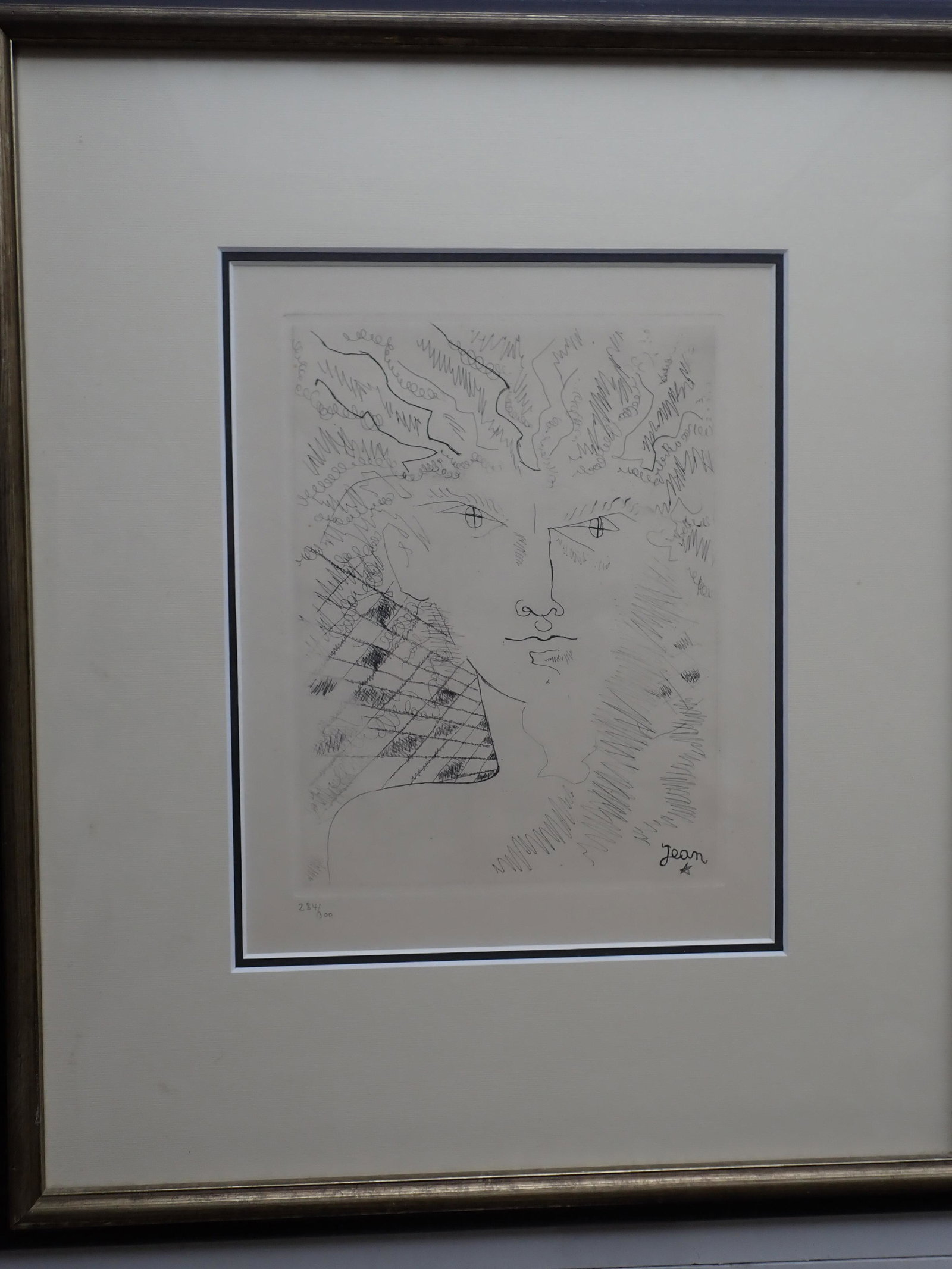 Jean Cocteau Surrealist Head of Young Man Circa 1944 284/300: Engraving. Frame: 20" x 17". Art: 11" x 9". See photos for condition and details. Local pick-up available on February 4th or 3rd party shipping available. Please see terms