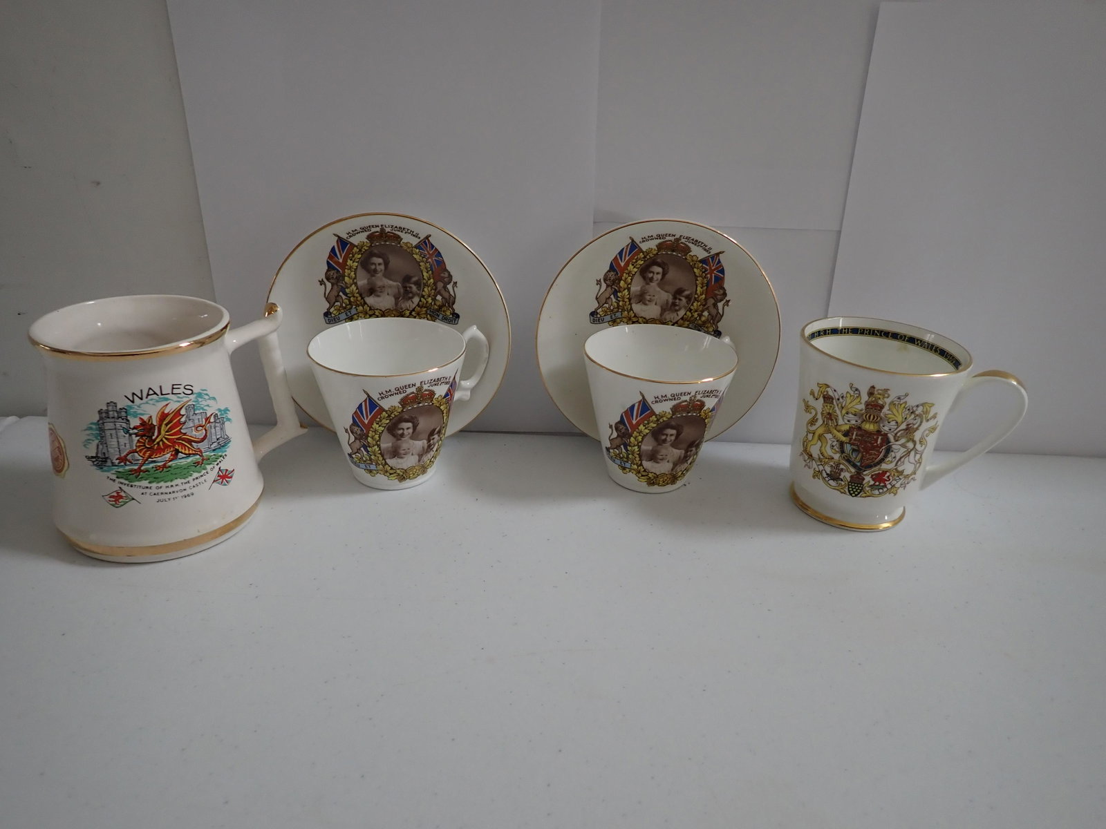 1953 Coronation of Queen Elizabeth II, 69 Investiture Mug, etc.: (2) 1953 Coronation of Queen Elizabeth II Salisbury Bone China Cups and Saucers with Prince Charles Pictured - Photographed by Marcus Adams, Prince Charles 1969 Investiture Mug, Aynsley & Prince Willi
