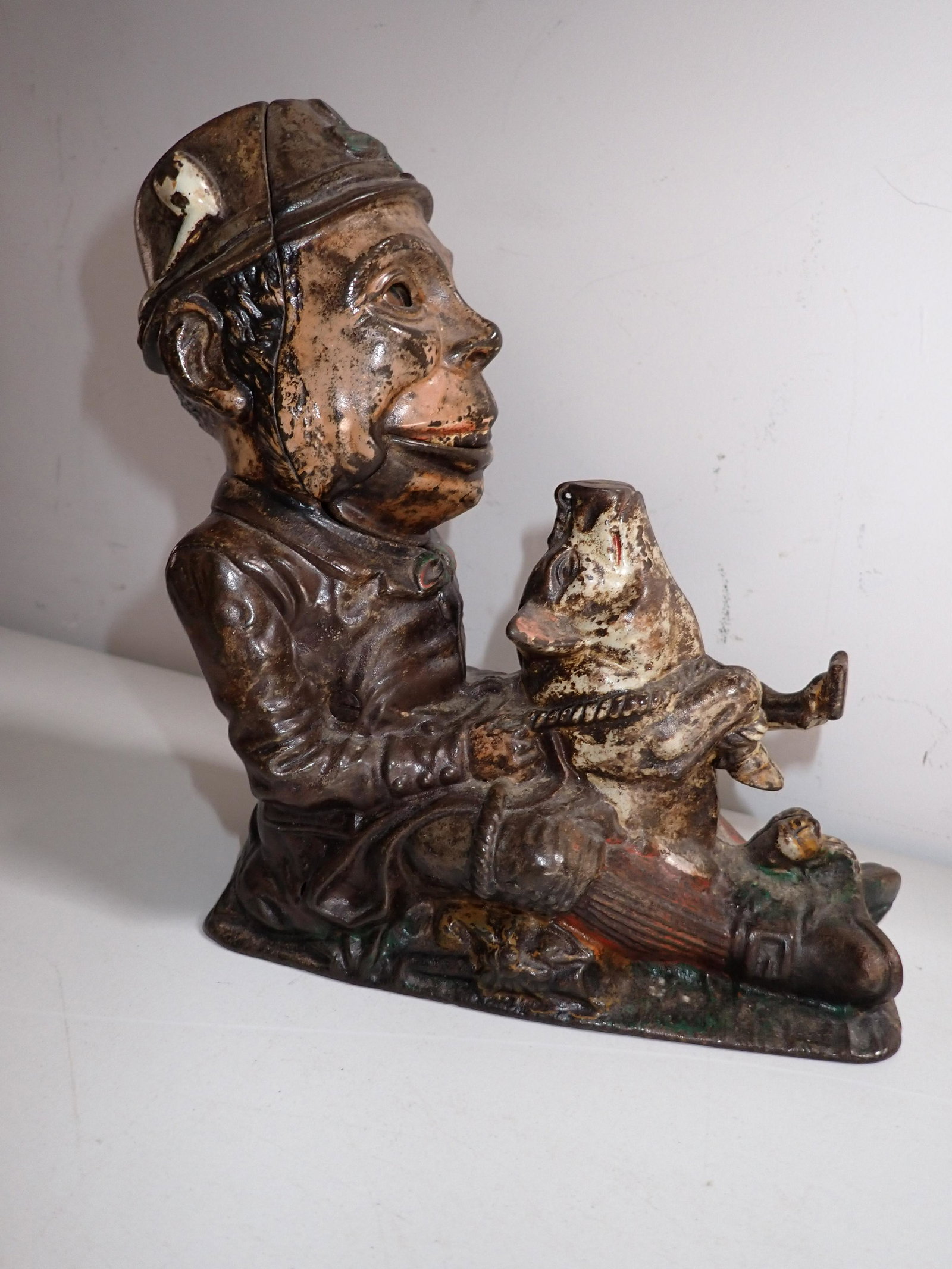 J. & E. Stevens Paddy and The Pig Mechanical Cast Iron Bank: Works. 1882 Patent Date - 8" High x 7" Wide. Some paint loss and small hole near leg.
