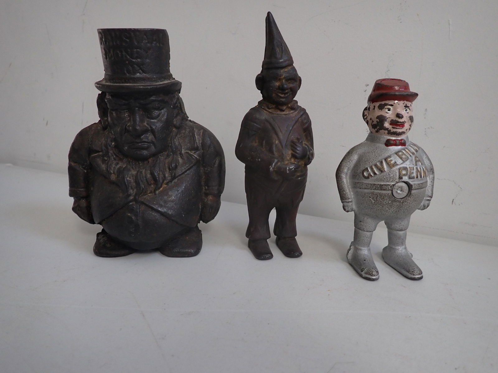 3 Cast Iron Figural Banks. "Give Billy a Penny, Clown and Other Bank (1 of 9)