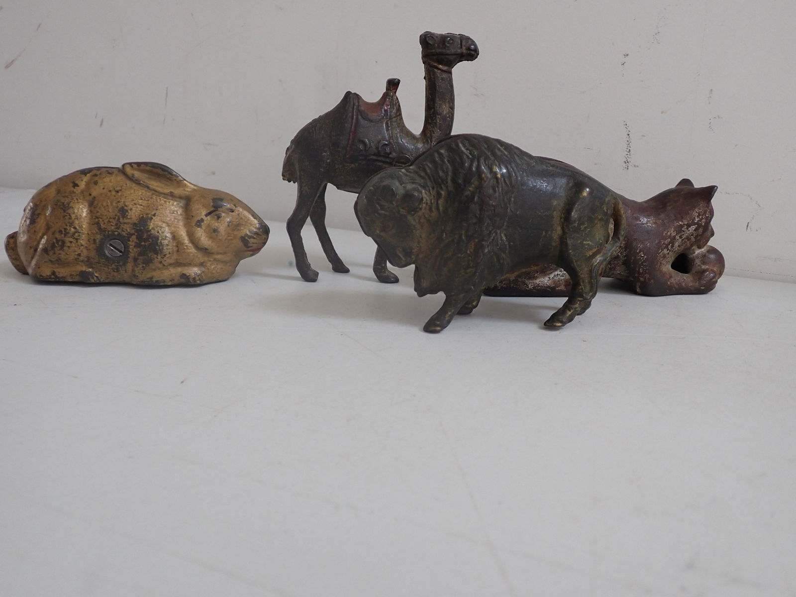 4 Cast Iron Banks. Rabbit, Camel, Cat and Buffalo (1 of 10)