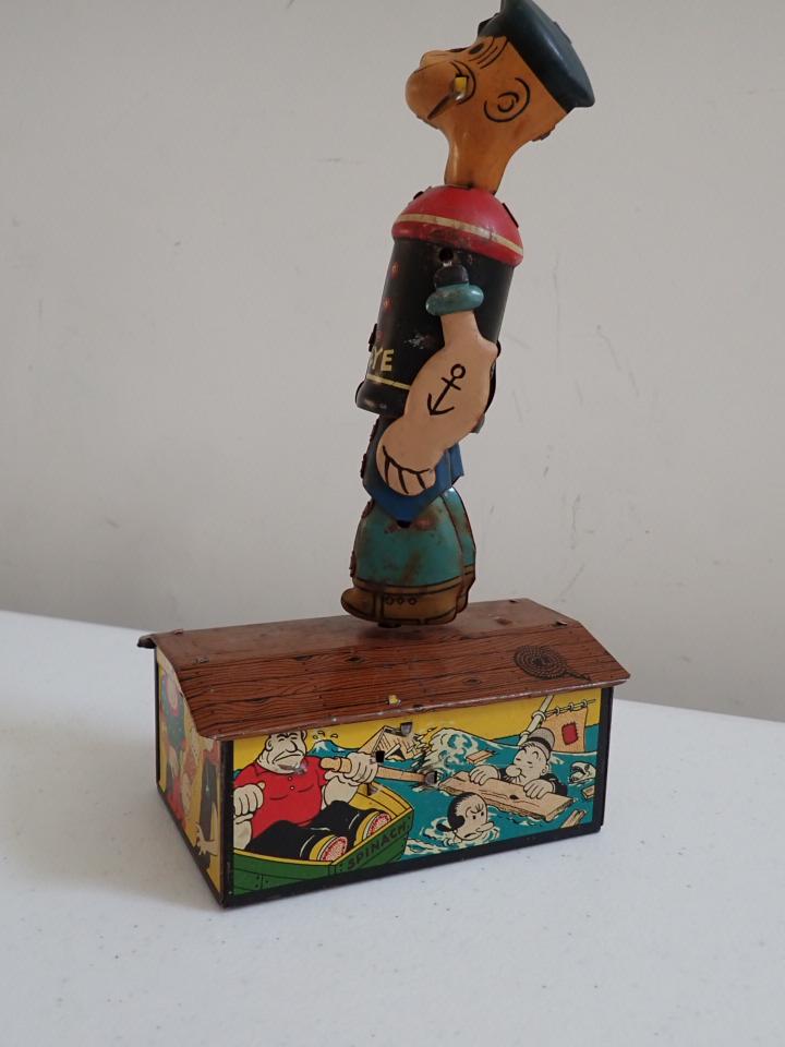 Popeye Wind Up Tin Toy. Marx Toy. Working Condition: 9 1/2" tall.