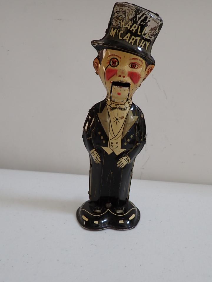 Charlie McCarthy Wind Up Tin Toy. Max Toys. Working Condition: 8" Tall. Some paint loss noticeable on hat.
