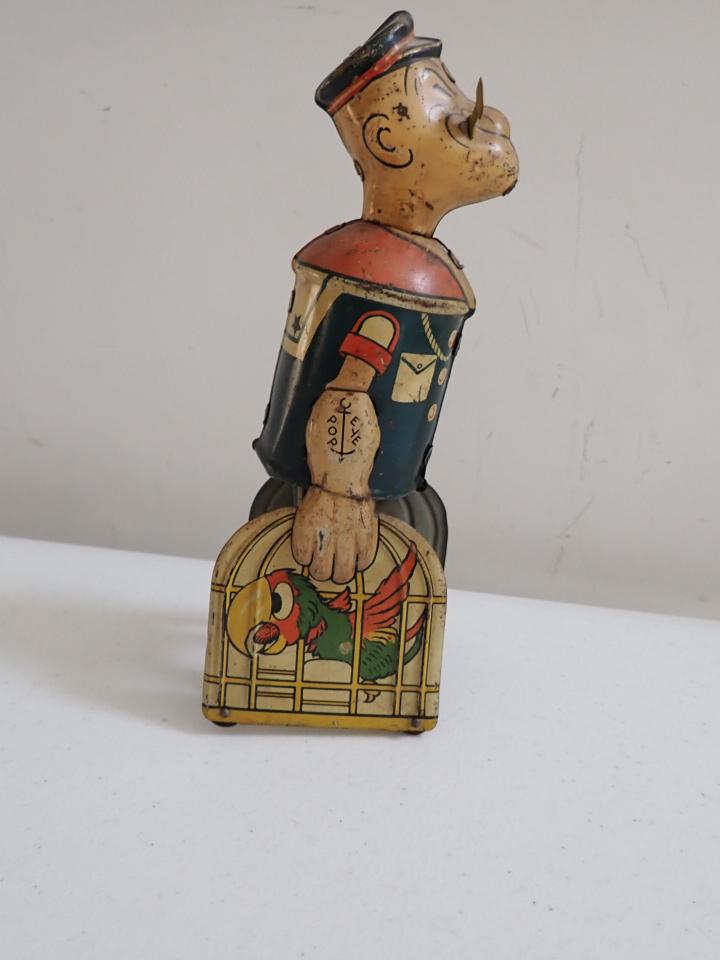 Wind Up Popeye Tin Toy. Marx. Working Condition: 8" Tall. Has some wear.