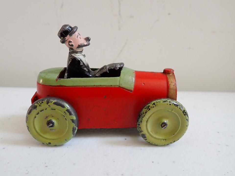 Cast Metal Andy Gump Tootsie: 3" Long. Has some paint loss.