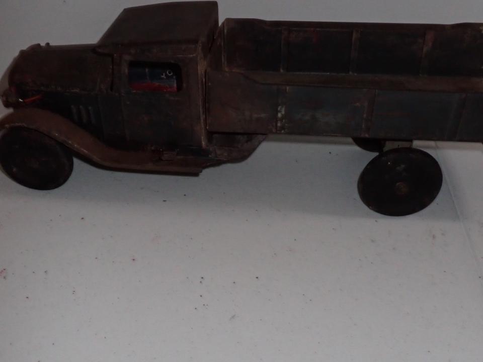 Buddy L Pressed Steel Truck.: 20". Missing part underneath chassis. Surface rust.
