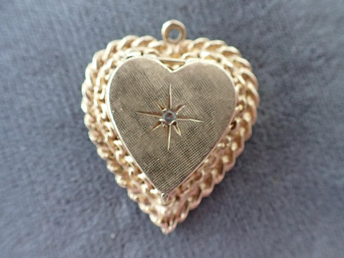 14 K Gold Heart Locket with Simulated Stone - 9.6 grams: Weight with stones
