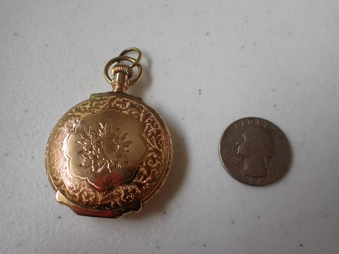 American Waltham Gold Colored Small Pocket Watch - Marked 14K: Serial number 9040053. Please see pictures for condition and details