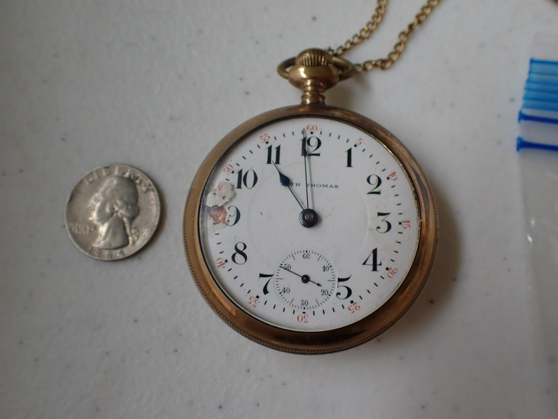 Seth Thomas Gold Plated Pocket Watch - 17 Jewel: Number 214848 - Chain and Gold Filled Clip. Gold Plate has wear.