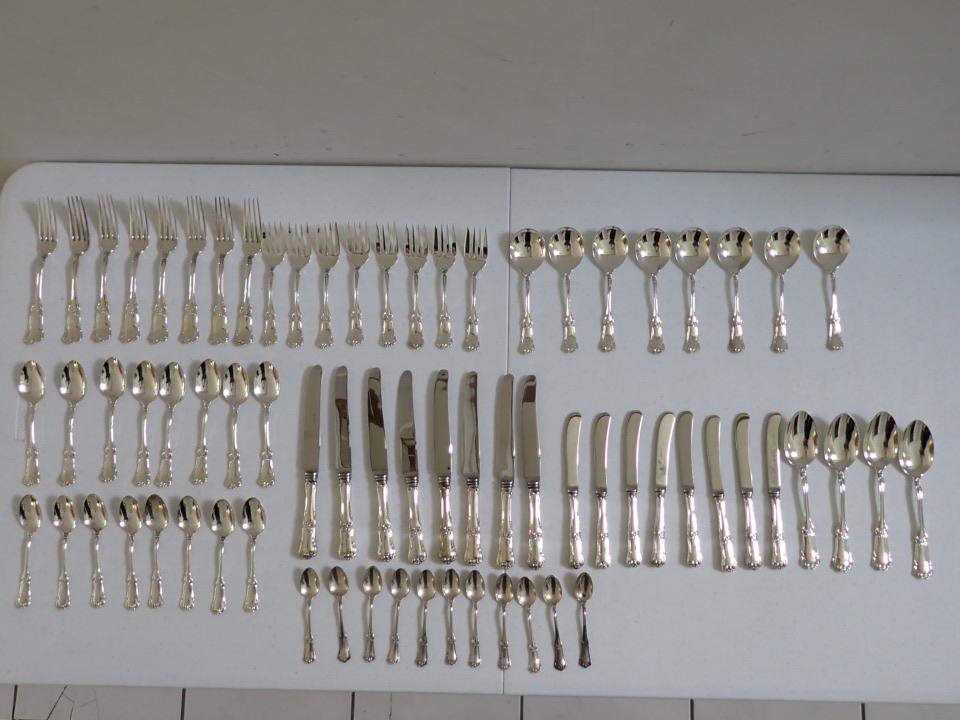 Birks Sterling Flatware Service - 71 Pieces: 8 - 7 1/2" Dinner Forks, 8 - 6" Forks, 8 Teaspoons, 8 Soup Spoons, 8 Dinner Knives, 8 Smaller knives, 4 Large spoons, 11 Demitasse spoons. 49.8 troy ounces - weighed without knives