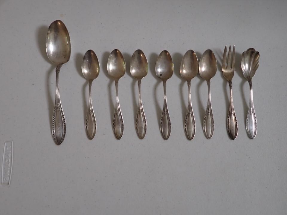 Durfee Sterling Silver Pat. 1874 Flatware: 6 Teaspoons, 2 Serving spoons & Serving Fork Marked Durfee. Monogrammed. Have some wear and a little pitting. 7.1 troy ounces