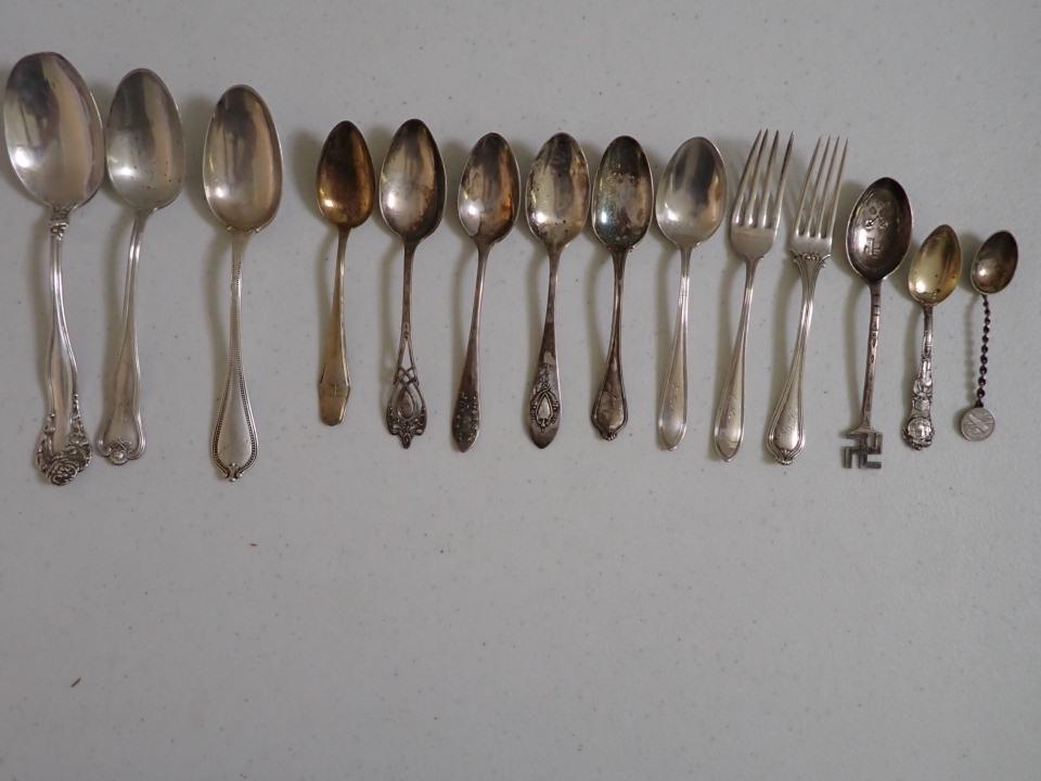 Sterling Silver Flatware: 3 Serving Spoons, 6 Teaspoons, 2 Lunch Forks and 3 Souvenir Spoons. 12.0 troy ounces.