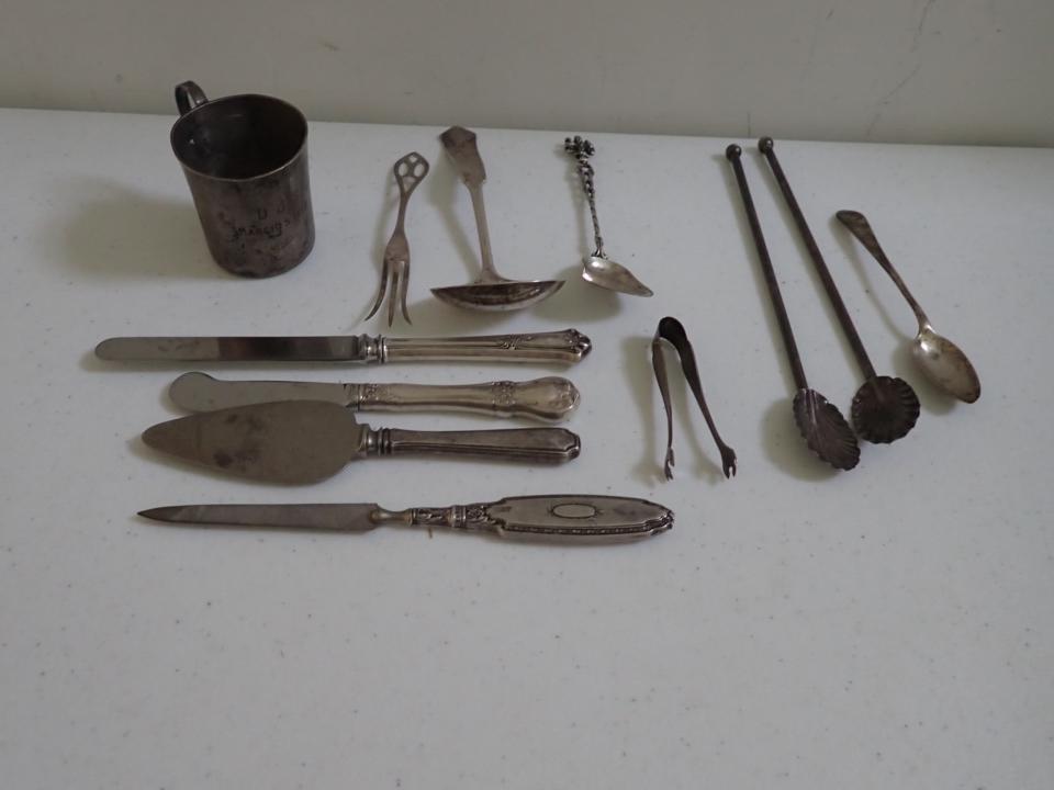 Sterling Silver Child's Cups, Small Serving Fork & Spoon, etc.: Tongs and Sterling Handled Knives, .800 Silver Spoon, Unmarked Silver Iced Teaspoons and Demitasse Spoon. 5.0 troy ounces - excludes knives.