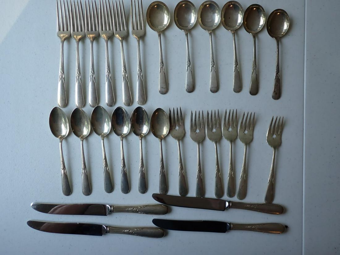 Sterling Silver Flatware - 28 Pieces: 25.6 troy ounces Excluding Knives. Some tarnishing