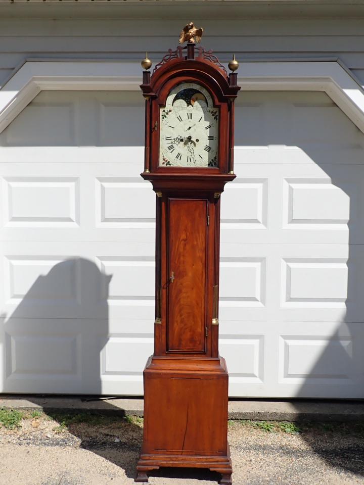 Tall Case Clock J. White Boston Moon and Sun Dial: Painting Dial with Moon and Sun. Inlaid Design in wood. 94". Wood has some splitting
