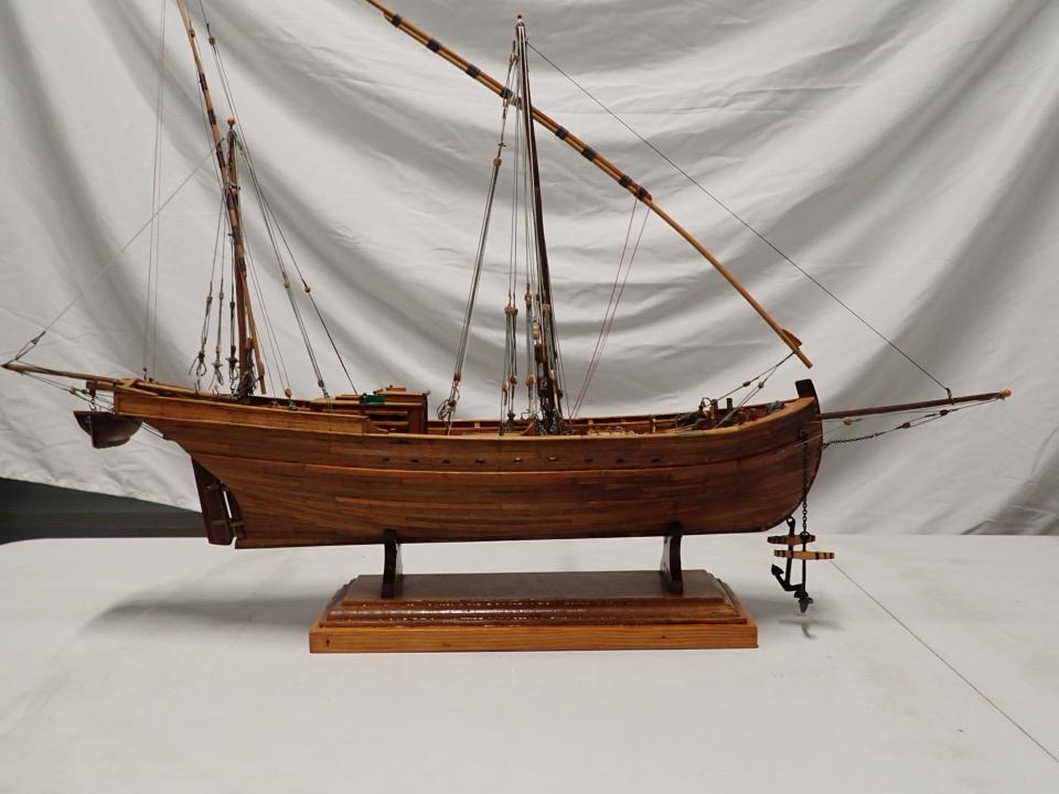 Finely Crafted Wooden Sailing Ship. 2 Anchors on Wood Stand: 33" wide x 25" high including base.