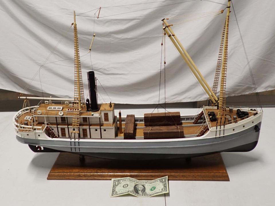 Wooden Finely Crafted Trawler Fishing Boat "San Francisco": One of the arms to hold the lifeboats is detached. 26" wide x 18" high including base.