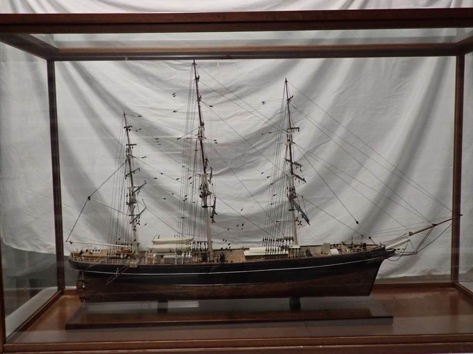 Beautifully Crafted Wooden Sailing Ship in Glass Display Case: 3 Masted Ship - Display Case: 52 1/2" wide x 32 1/2" High x 17" Deep. Ship Length is 45" x 29" high with Base.