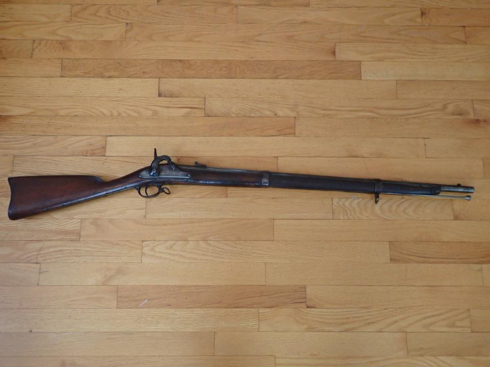 Springfield Rifle Marked US Springfield 1864: Trigger Mechanism works. Overall Length 48". Barrel 32". Wood stock and Barrel wear.