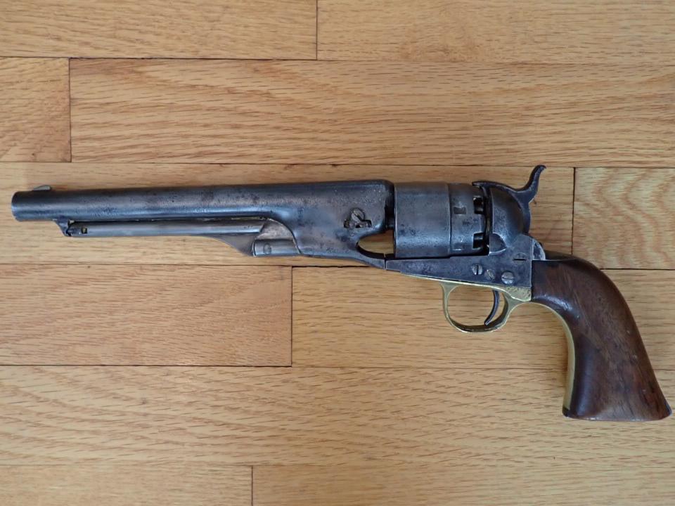 Colt Revolver 1850 Patent. Matching serial #s. 6294 - Pat. 1850: Colts patent no. Sept. 10, 1850. Brass Trigger Guard. Barrel shows wear consistant with age. Some small pit marks next to cylinder. Fire mechanism works.