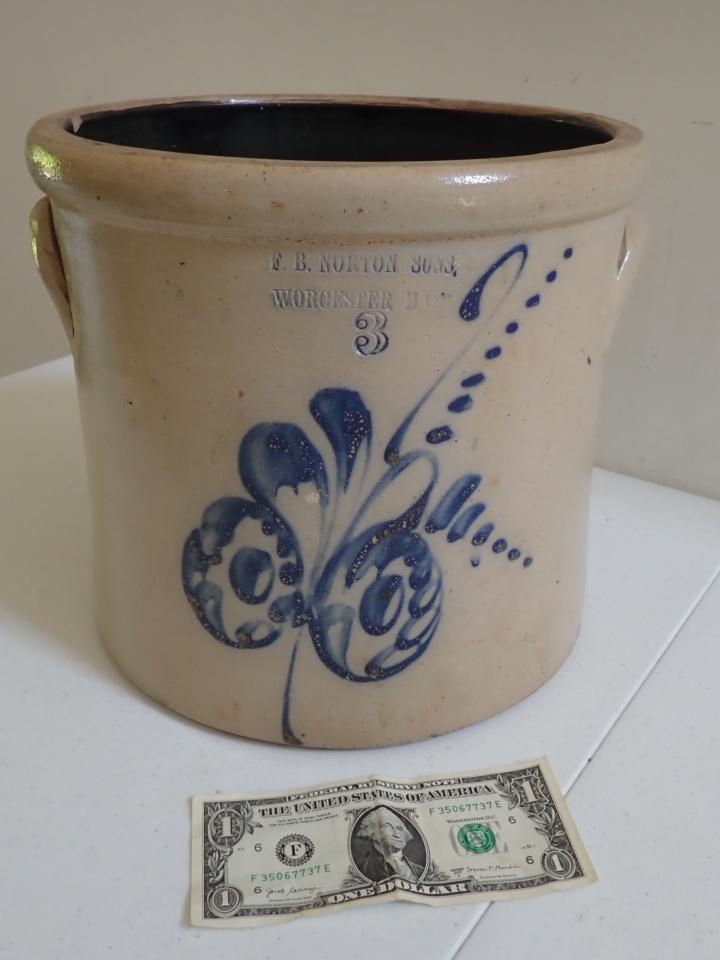 F. B. Norton & Sons Worcester, MA 3 Gallon Stoneware Crock: Cobalt Blue Design. Has some small chips inside top rim and cobalt design has some chipping. 10" high - 10 1/2" diameter.