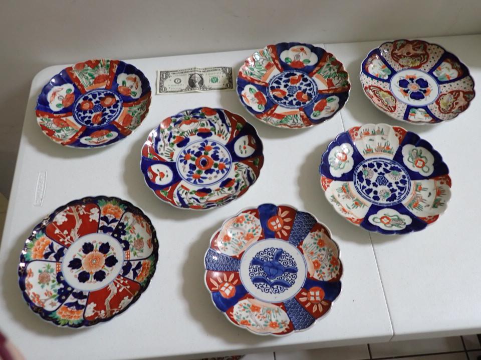 7 Imari Plates with Scalloped Edges and Various Designs: 8 1/2" - 8 1/4" in Diameter. Part of Large Collection of Imari/Arita Porcelain from Massachusetts Estate. 1 has edge chip, but otherwise overall good condition.