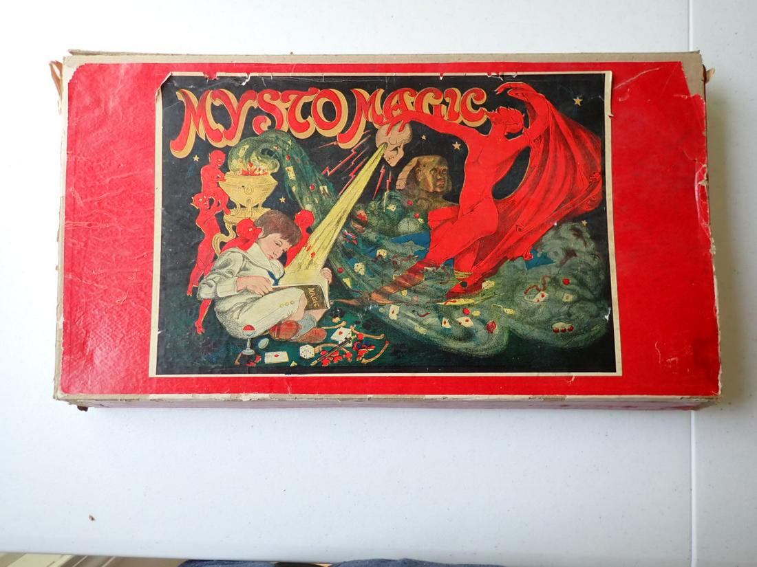 Vintage Mysto Magic Magician Set - 14 Magic Tricks, etc.: Has 14 magic tricks inside rings. Also card trick in envelope. Has 1 missing and also empty envelope. The magic tricks show some wear. Box has wear and is detached paper and missing one end.