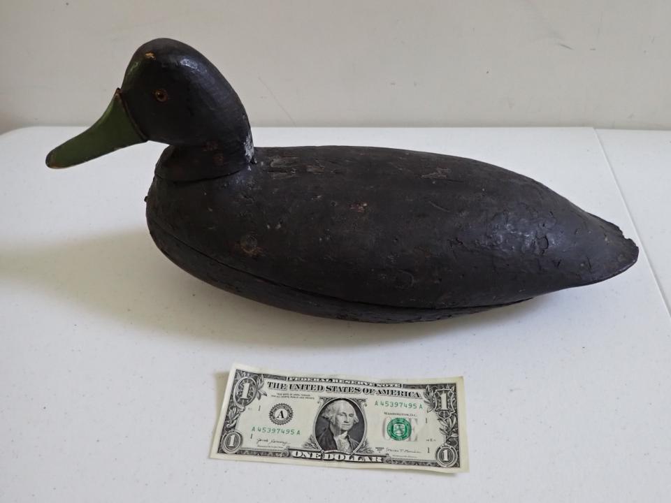 Vintage Black Wood Duck Decoy. Green Bill. Glass Eyes.: 16" wide. Has wear with split in body.