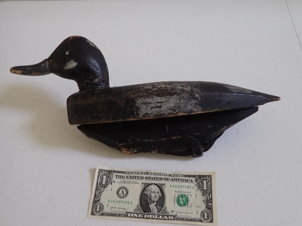 Vintage Wooden Duck Decoy. Black with some grey paint.: 14" wide. Has some wear.