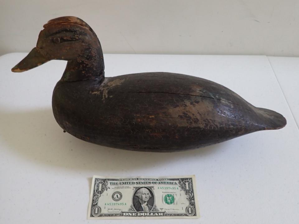 Vintage Wooden Duck Decoy. Green Bill. Wooden Eyes: 16". Has some wear on head and beak. Missing small piece from neck.
