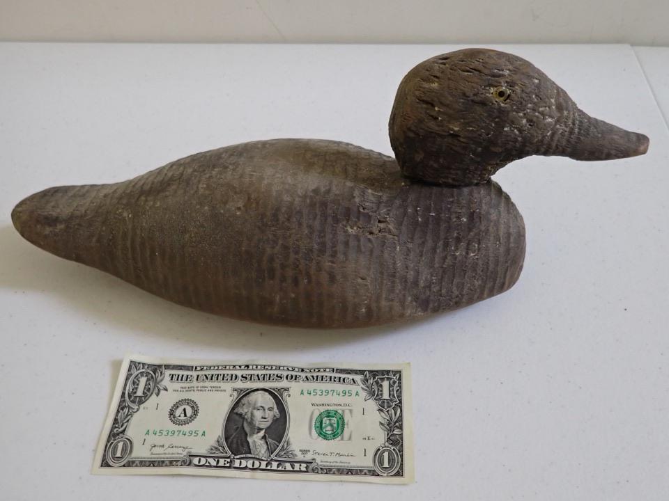 Vintage Wooden Duck Decoy. Carved Lines. Natural Tone.: 14". Glass Eyes (1 missing). Has split in chest and some other wear.