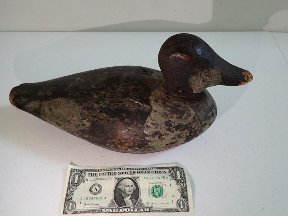 Vintage Wooden Duck Decoy. Black and Grey.: 12 1/2". Has wear on end of beak and tail. Some holes