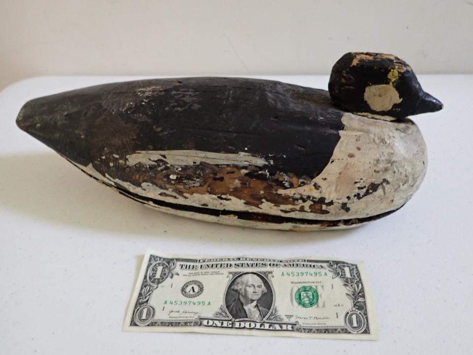 Vintage Wooden Duck Decoy. Black and White.: 13". Folk Art with Small Head. Has split in body. Some paint wear.