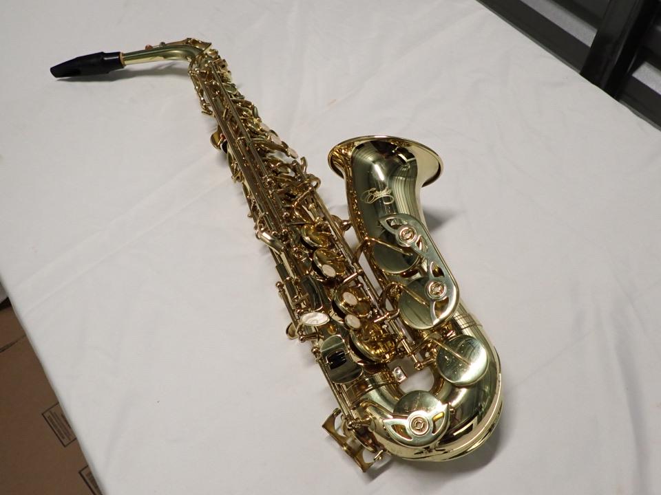 Etude Brass Saxophone with Mother of Pearl Keys: Has Mouthpiece. Overall good condition.