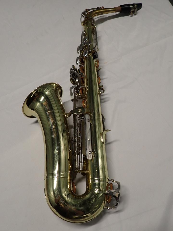 Bundy "the Selmer Company" Brass Saxophone MOP Keys: Mother of Pearl keys and Mouthpiece. Good Overall Condition.