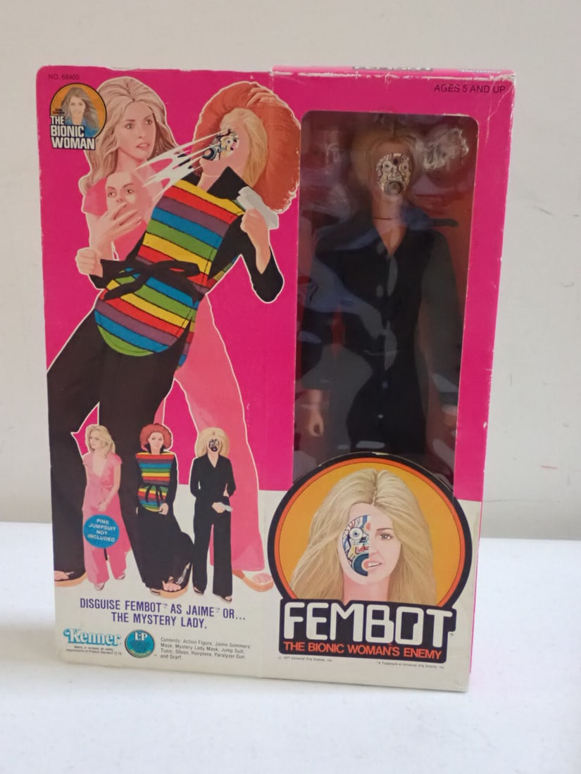 1977 Fembot The Bionic Woman's Enemy in Box: By Kenner. "Disguise Fembot as Jaime or… The Mystery Lady… Figure is mint in box. Box has some wear with removed label, some creasing and staining. Box sealed on both ends