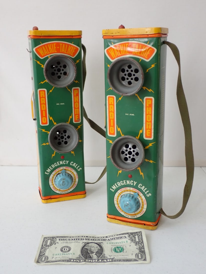 Pair Tudor 1940's Metal Walkie Talkies: Have some wear with minor scuffing. One has small dent.